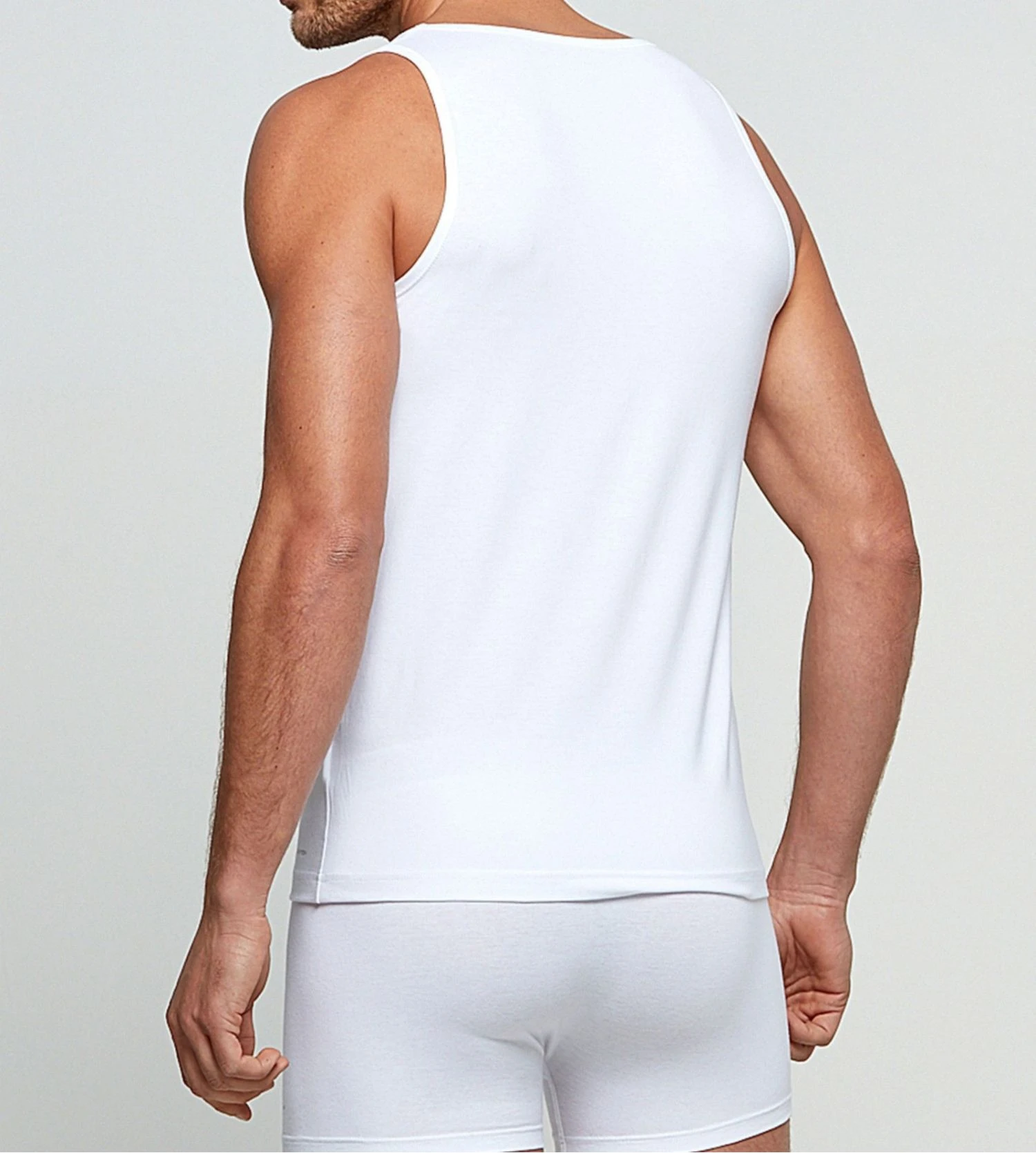 Impetus Innovation – Débardeur Homme Blanc Thermorégulateur Outlast – Coupe Ajustée 5 Impetus Innovation – Débardeur Homme Blanc Thermorégulateur Outlast – Coupe Ajustée – Image 3