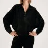 Calida Noir Velours Lounge Seduction – Sweat-shirt à Manches Chauve-souris et Col Zippé