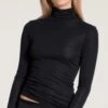 Calida Pull Fin Laine & Soie à Col Roulé Noir True Confidence 2 Calida Pull Fin Laine & Soie à Col Roulé Noir True Confidence -Lingerie Sipp top manches longues col roule noir